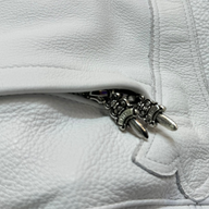 CLB XXIII Chrome Hearts white leather bean bag chair featuring signature sterling silver dagger zipper pull detail