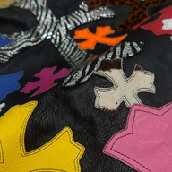 CLB XXIII Chrome Hearts leather bean bag chair featuring black leather with vibrant multicolor cross appliques
