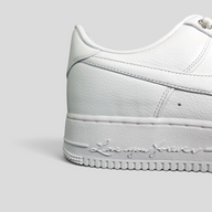 CLB XXIII Chrome Hearts X Nocta white leather Air Force 1 Low sneaker featuring Love You Forever script on the midsole