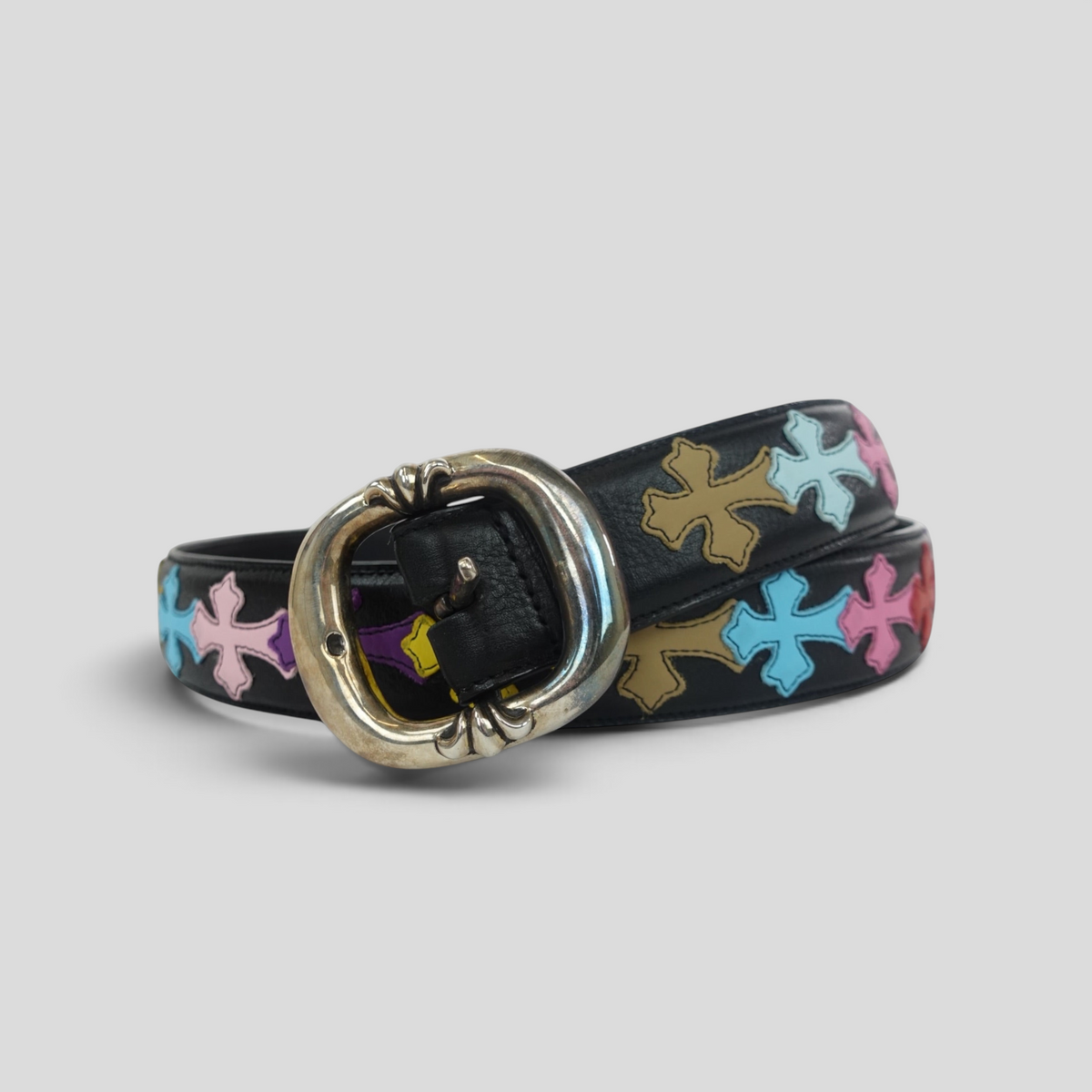 CLB XXIII Chrome Hearts black leather belt featuring colorful rainbow cross patches and a silver gunslinger buckle