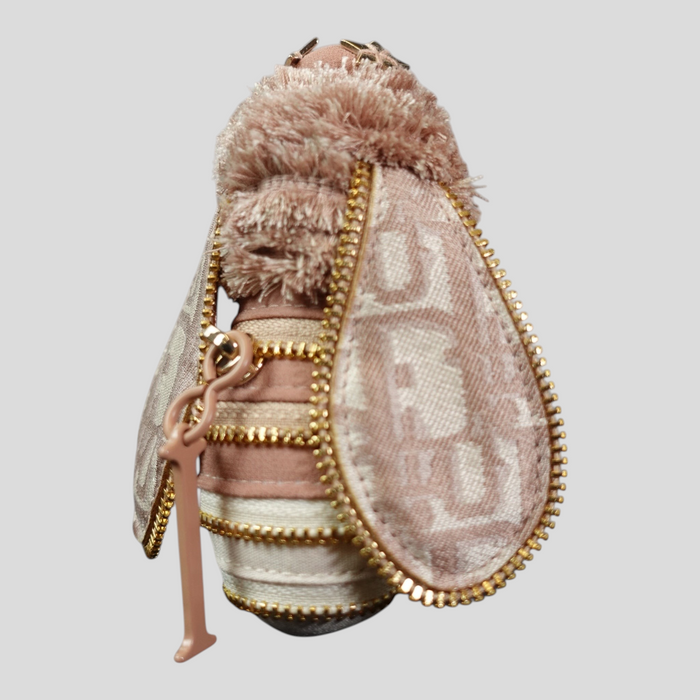 CLB XXIII Dior bee keychain in purple and beige featuring signature monogram canvas wings and gold-tone hardware.