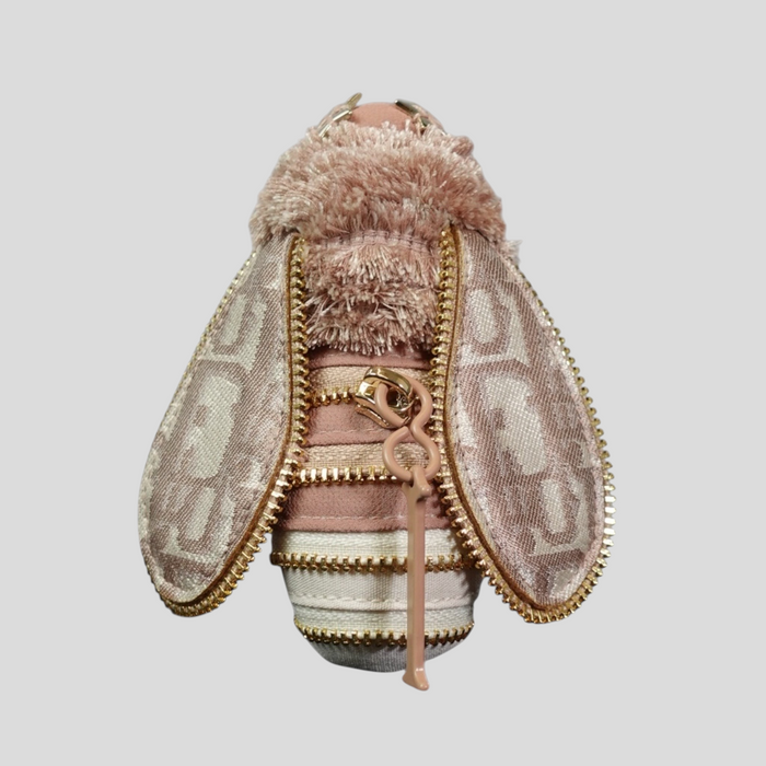 CLB XXIII brand-new Dior bee keychain in purple and beige with gold-tone zipper details and monogram fabric wings.