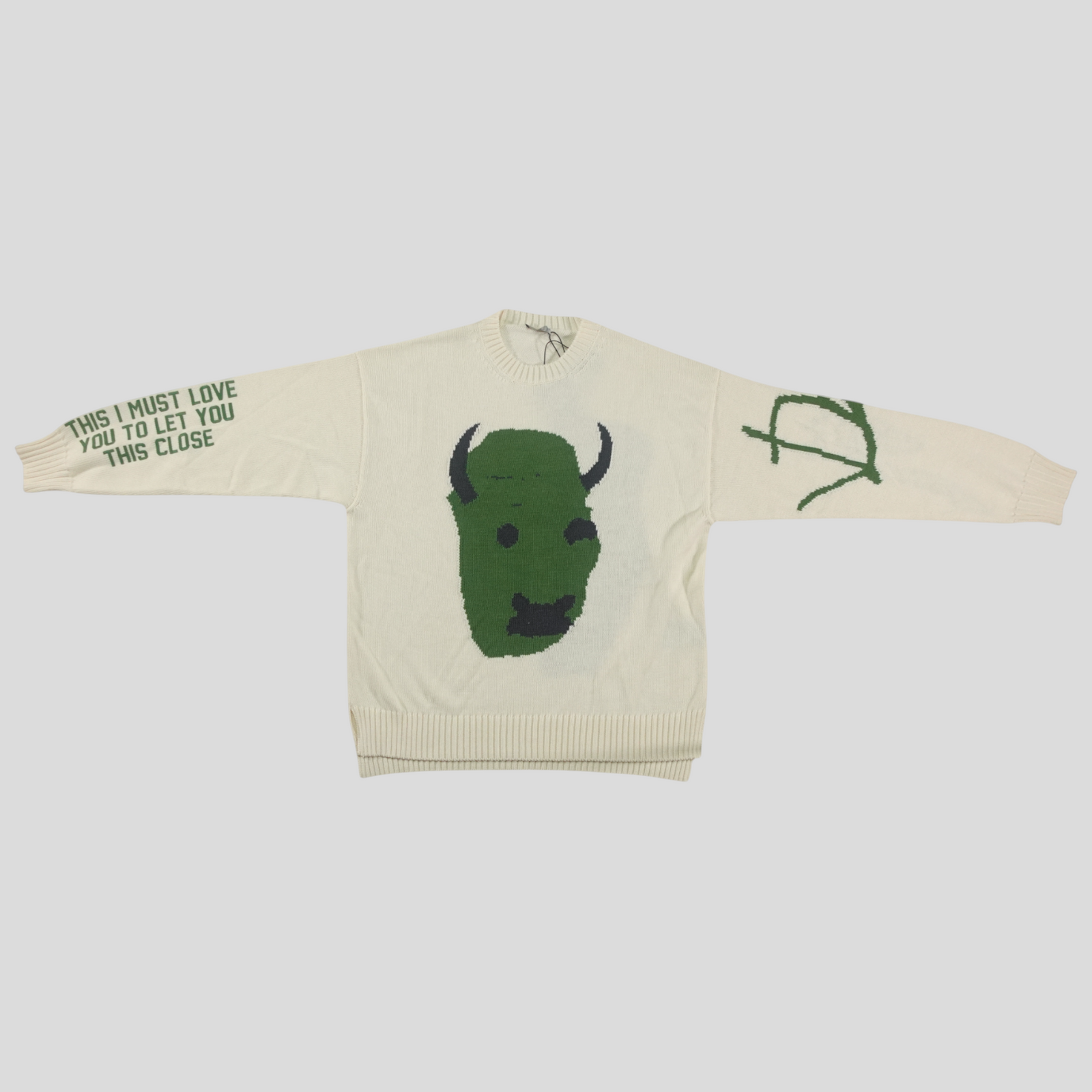 CLB XXIII Dior Cactus Jack oversized ecru virgin wool knit sweater with green graphic and text on sleeves