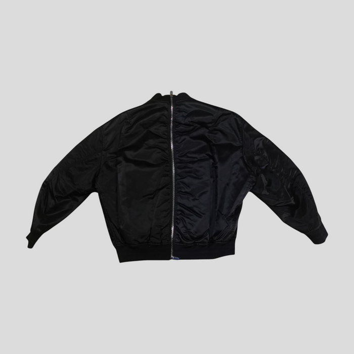 CLB XXIII Dior X Judy Blame black and navy blue polyamide bomber jacket with a full-length back zipper closure.