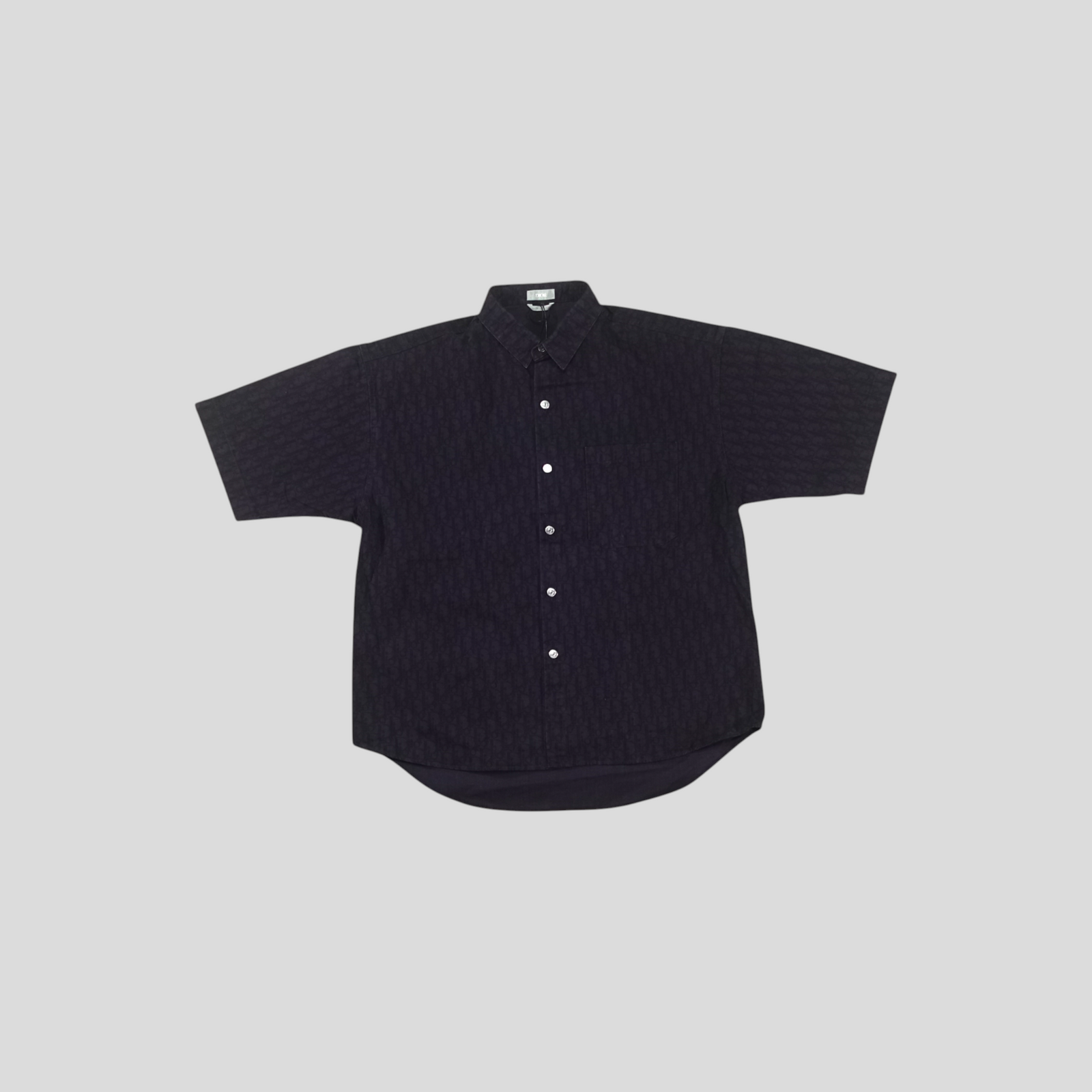 CLB XXIII Dior Oblique denim short sleeve overshirt in dark blue cotton with button-down front and chest pocket.