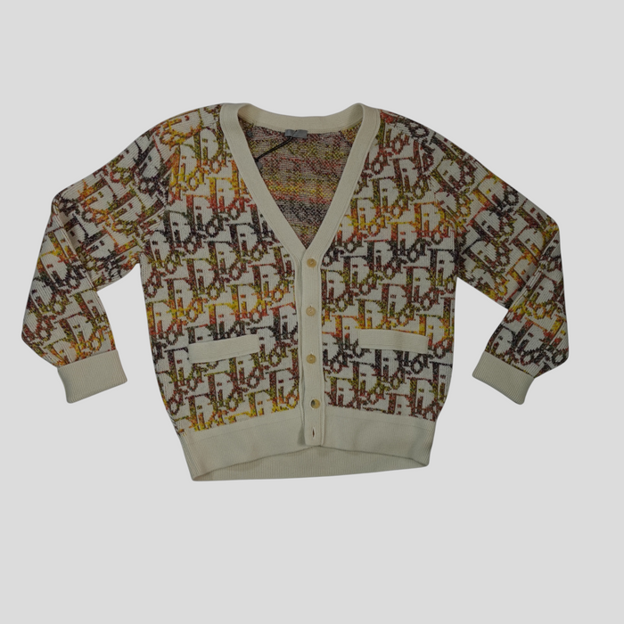 CLB XXIII Dior Oblique knit cardigan in white with a multicolor monogram pattern, featuring front pockets and buttons.