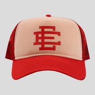 CLB XXIII Eric Emanuel cherry red trucker hat with a beige front panel and red mesh back featuring the EE logo