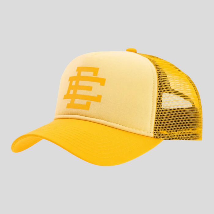 CLB XXIII Eric Emanuel trucker hat in light yellow with a mesh back and bold EE logo on the front panel