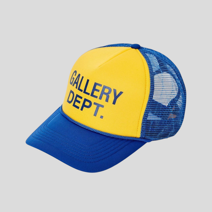 CLB XXIII GALLERY DEPT. trucker hat in blue and yellow with a mesh back and bold front logo lettering