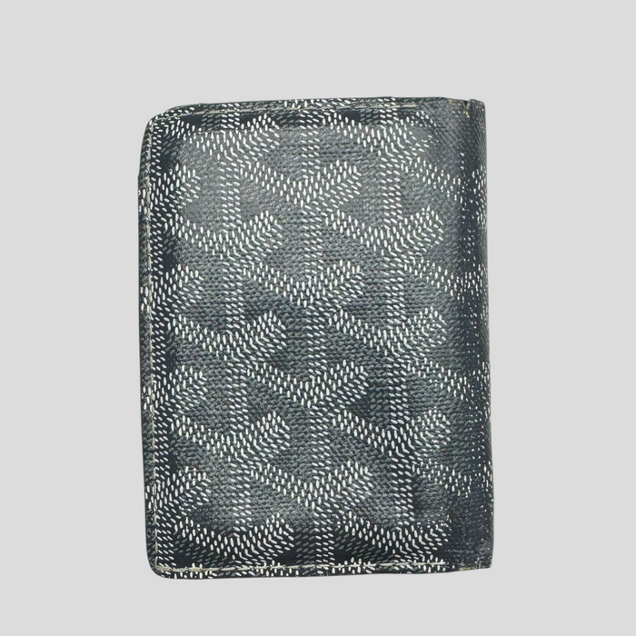 CLB XXIII pre-owned grey Goyard Saint Marc cardholder featuring the iconic chevron print, showing signs of heavy wear.