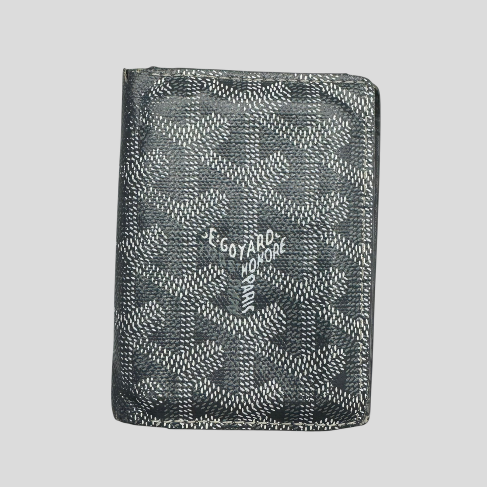 CLB XXIII pre-owned grey Goyard Saint Marc cardholder featuring the iconic chevron print and visible signs of wear.