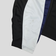 CLB XXIII GV Gallery Infinity jersey sleeve in black, white, and navy with a small stain on the white panel