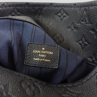 CLB XXIII Louis Vuitton Empreinte Artsy MM bag interior label with navy blue striped lining and embossed leather