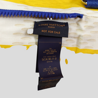 CLB XXIII Louis Vuitton SS26 yellow beach towel bag interior care label with cotton and polyester composition details