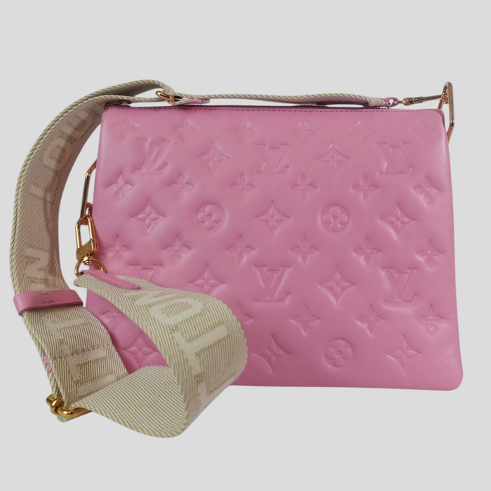 CLB XXIII Louis Vuitton Coussin PM handbag in rose pink leather with embossed monogram pattern and canvas strap