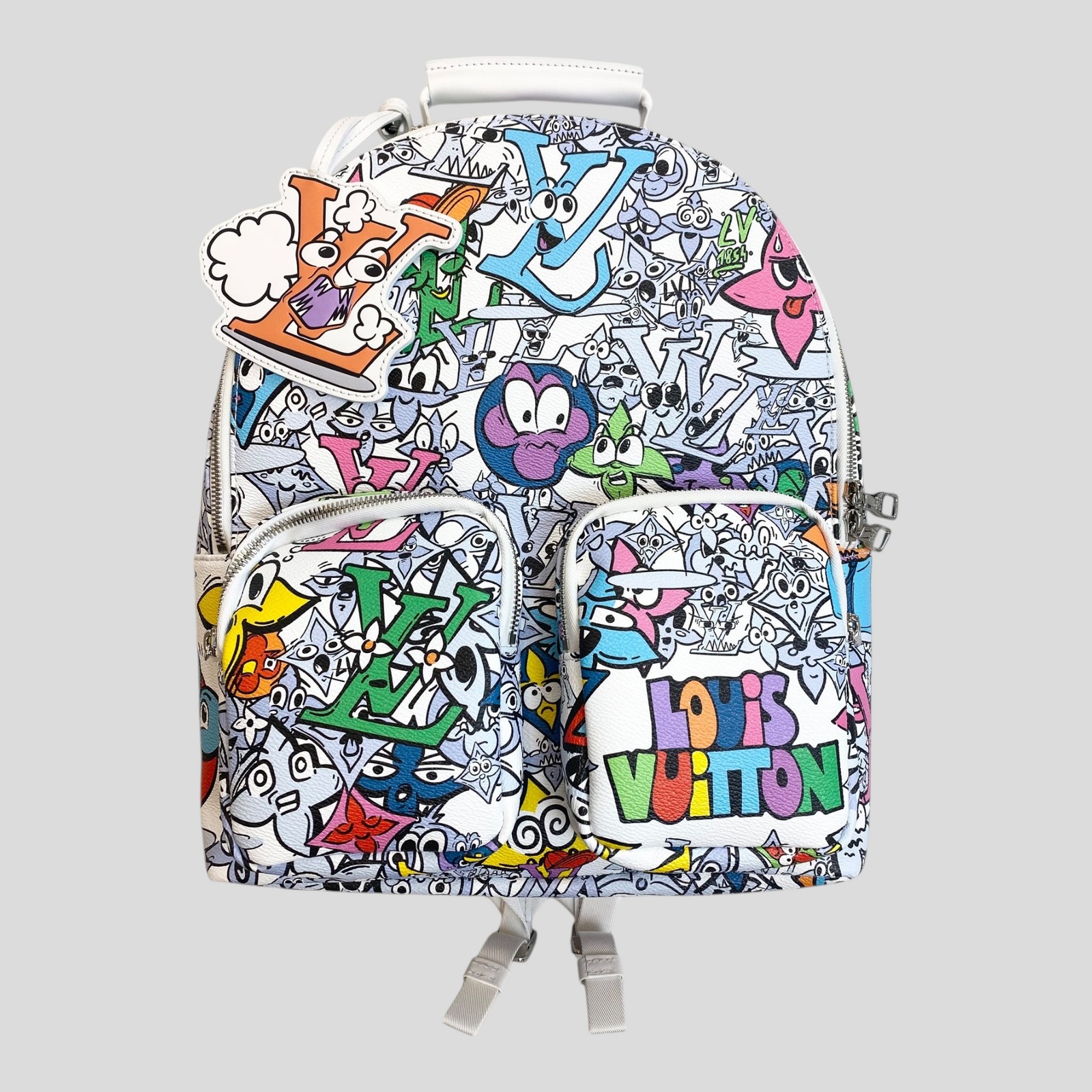 CLB XXIII Louis Vuitton multipocket backpack featuring a vibrant multi-colored graffiti print and cartoon motifs.