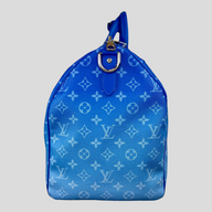 CLB XXIII Louis Vuitton Keepall Bandouliere 50 travel bag in blue Monogram Clouds canvas with silver hardware