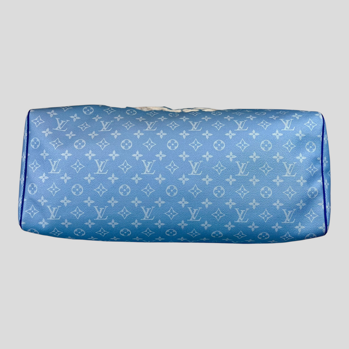 CLB XXIII Louis Vuitton Keepall Bandouliere 50 travel bag in blue Monogram Clouds canvas with white leather trim