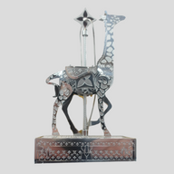CLB XXIII Louis Vuitton silver metal giraffe holiday ornament featuring intricate monogram patterns and a base
