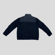 Back view of CLB XXIII Moncler 1952 Brohan reversible navy blue fleece jacket with smooth shoulder panel