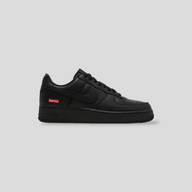 CLB XXIII Nike Air Force 1 Low Supreme sneaker in all-black leather with a red Supreme box logo on the heel