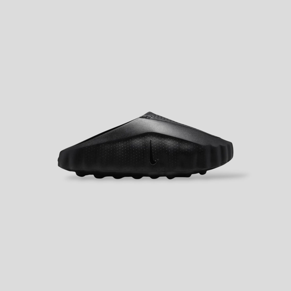 CLB XXIII Nike Mind 001 slide in triple black featuring a perforated foam construction and side swoosh logo