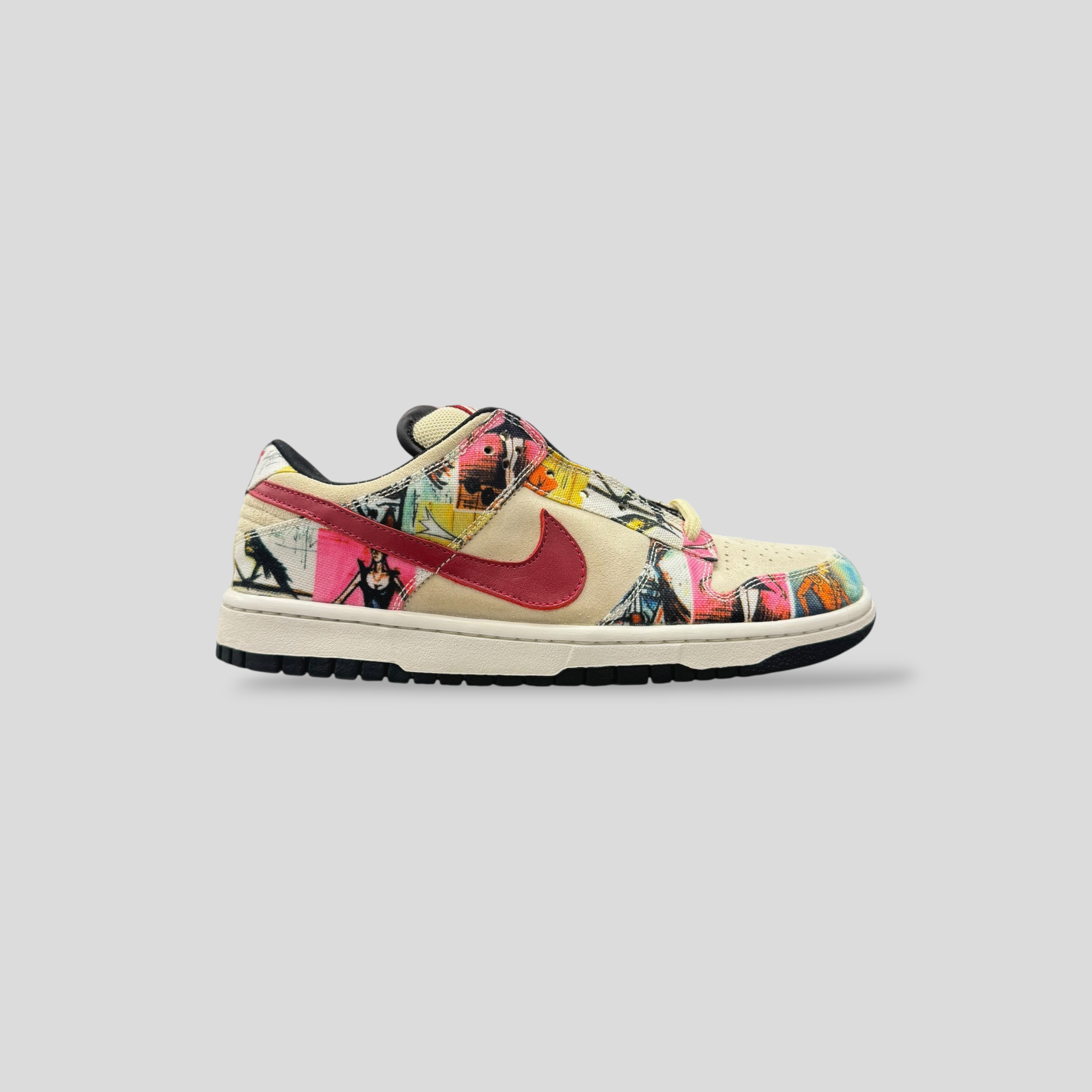 CLB XXIII Nike SB Dunk Low Paris sneaker featuring a unique canvas upper with colorful artwork and a cardinal swoosh.