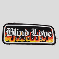 CLB XXIII red Carhartt work jacket featuring a distressed Blind Love Forever embroidered patch with flame details