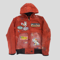 CLB XXIII red Carhartt work jacket featuring patchwork designs, distressed paint splatters, and a hooded silhouette.