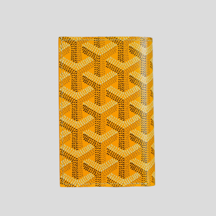 CLB XXIII yellow Goyard Saint-Pierre card wallet featuring the iconic chevron print on coated canvas
