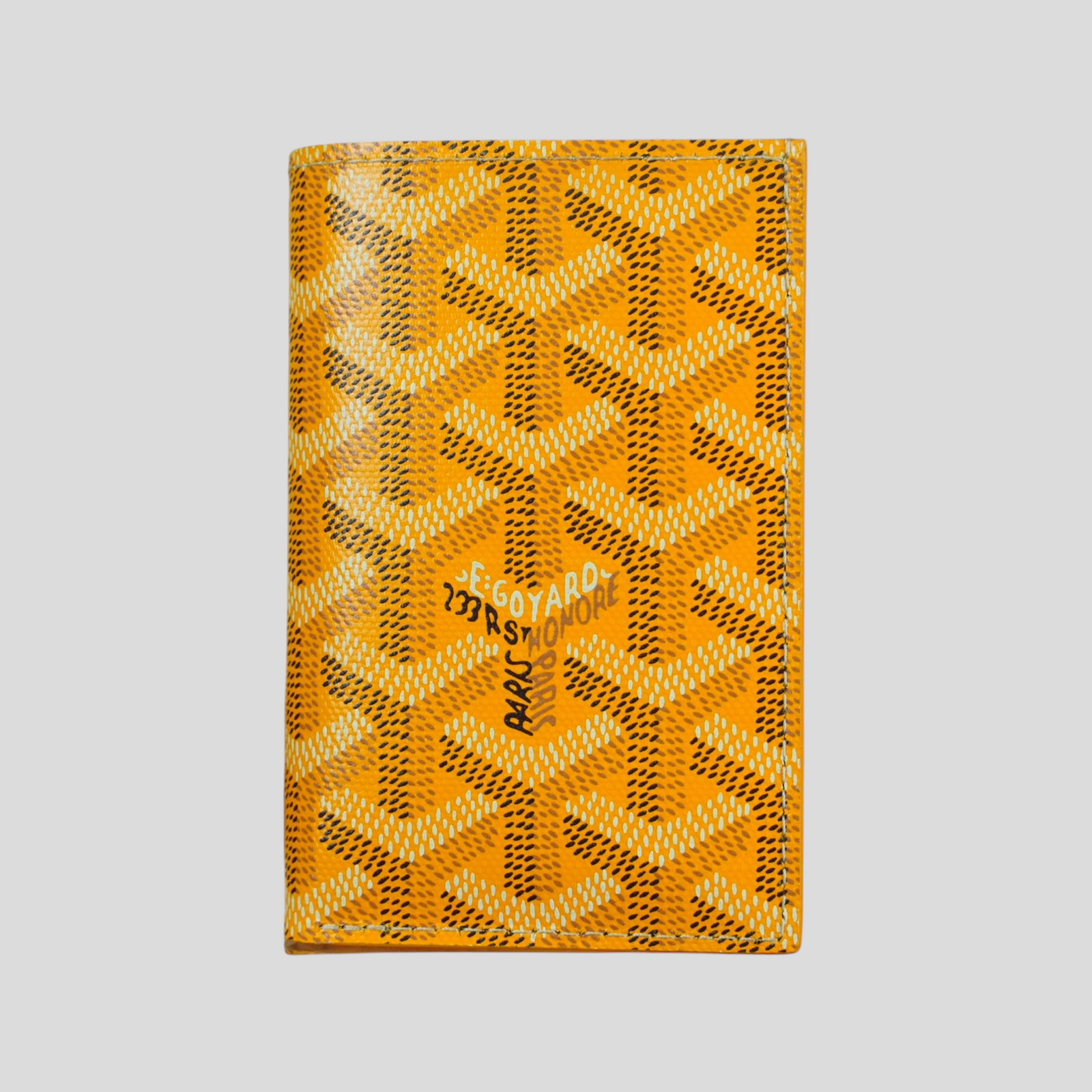 CLB XXIII yellow Goyard Saint-Pierre card wallet featuring the iconic chevron print and Paris branding