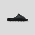 CLB XXIII YZY YS-01 black injection-molded EVA foam slide with a minimalist design and deep-grooved traction sole