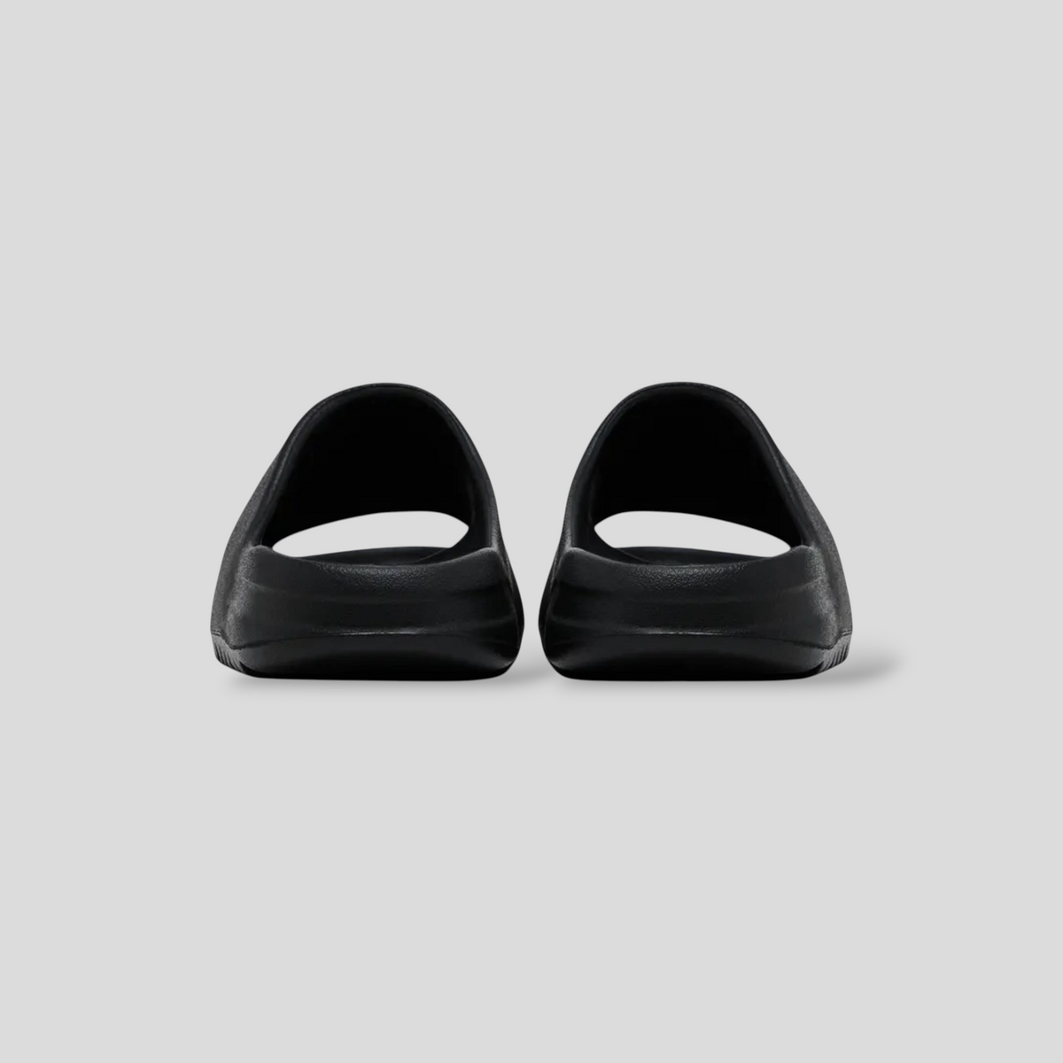 CLB XXIII YZY YS-01 black EVA foam slides featuring a minimalist injection-molded design and squared-off platform