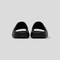 CLB XXIII YZY YS-01 black EVA foam slides featuring a minimalist injection-molded design and squared-off platform