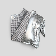 CLB XXIII reversible silver puffer jacket featuring embossed Monogram pattern and checkered cotton lining