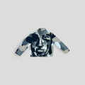 CLB XXIII Louis Vuitton patchwork portrait denim jacket in black, grey, and white cotton with a zip-up front.