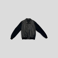 CLB XXIII black Louis Vuitton LVSE monogram embossed lambskin and wool blouson jacket with front zip closure