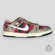 The Nike SB Dunk Low Freddy Krueger is considered one of the rarest sneakers ever produced. Originally inspired by the horror film "A Nightmare on Elm Street," the shoe was cancelled before its official release after licensing concerns. Only a very limited number of pairs escaped into circulation, making it one of the most sought-after Nike SB Dunk releases in history.