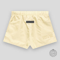 FEAR OF GOD ESSENTIALS  RUNNING SHORTS FW22 "CANARY"