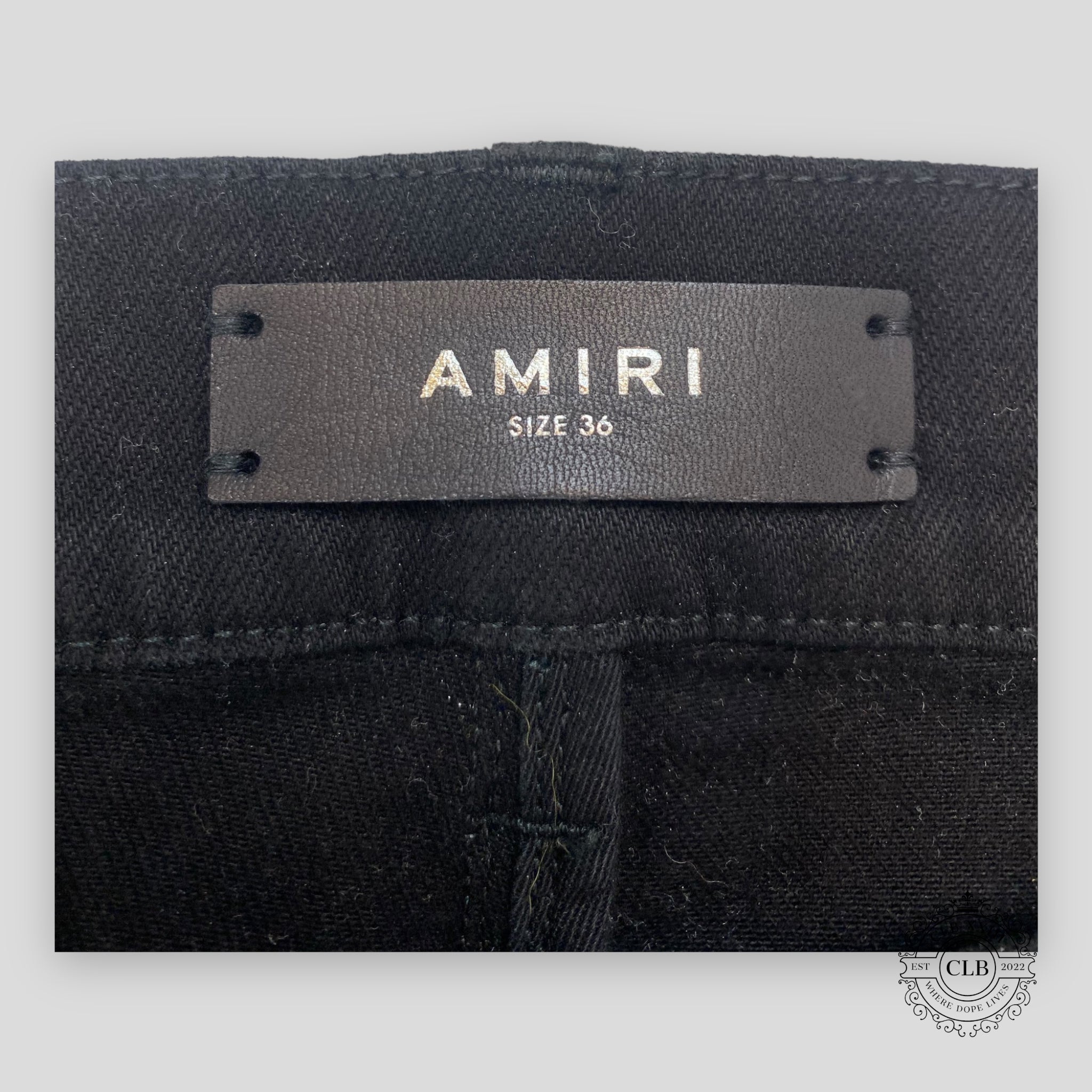 Amiri Hawaiian Star Art Patch Jeans in Black